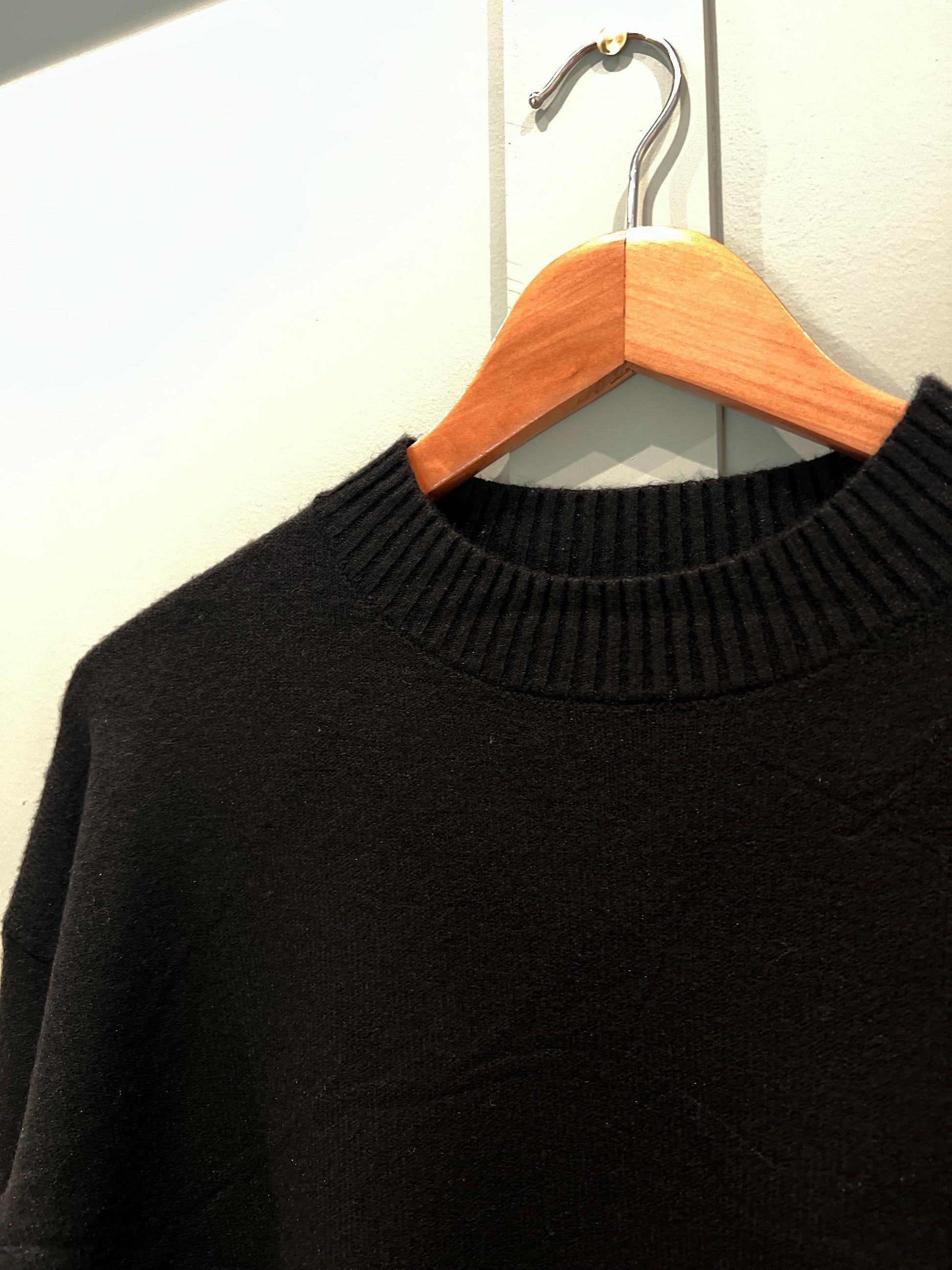 Black Ladies Jumper with Button Side Detailing. Stunning jumper with buttons on the side, One size fits most, Long Sleeved.
